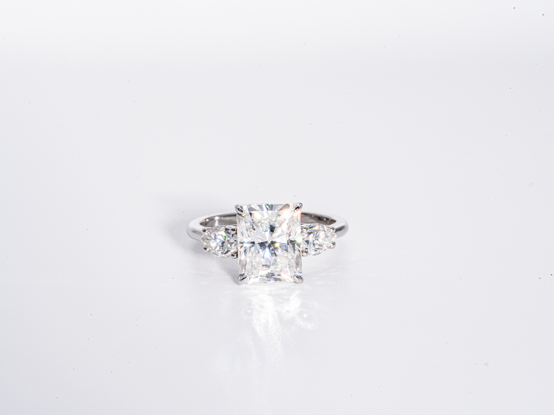 4 Carat Radiant Cut with Pear Shaped Side-Stone Moissanite Engagement Ring