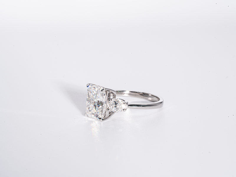 4 Carat Radiant Cut with Pear Shaped Side-Stone Moissanite Engagement Ring