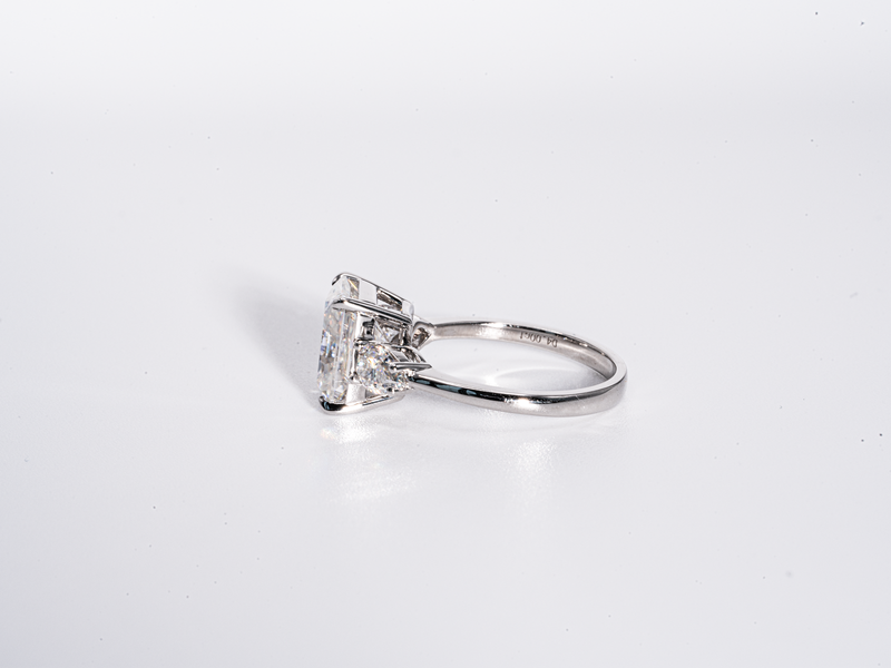 4 Carat Radiant Cut with Pear Shaped Side-Stone Moissanite Engagement Ring