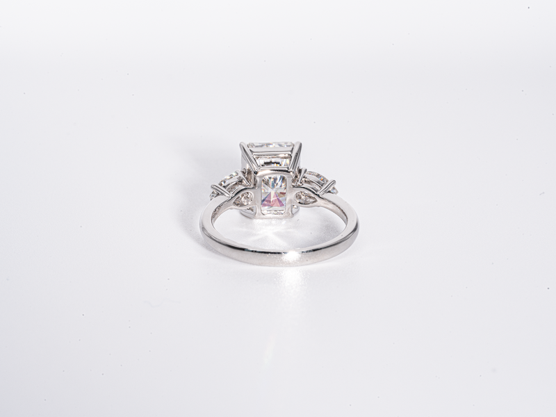 4 Carat Radiant Cut with Pear Shaped Side-Stone Moissanite Engagement Ring