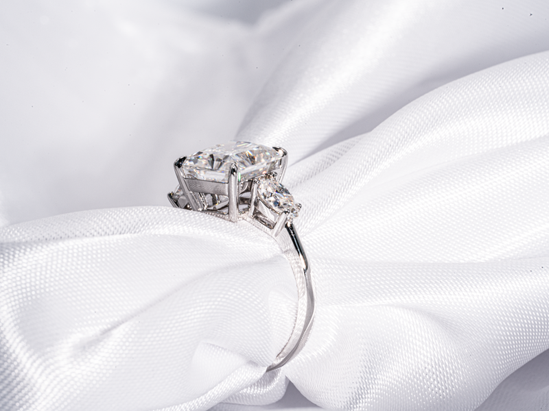 4 Carat Radiant Cut with Pear Shaped Side-Stone Moissanite Engagement Ring