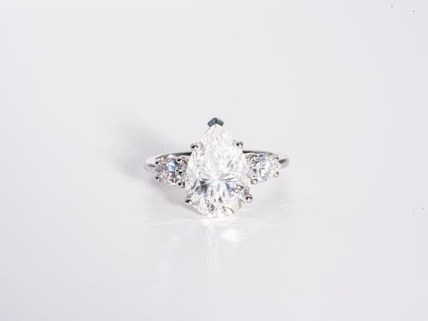 4.5 Carat Pear Shaped with Pear Shaped Side-Stone Moissanite Engagement Ring