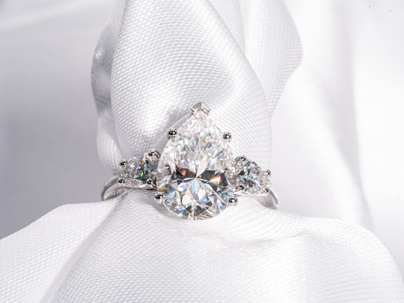 4.5 Carat Pear Shaped with Pear Shaped Side-Stone Moissanite Engagement Ring