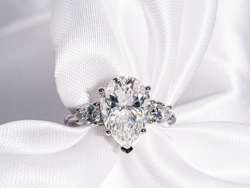 4.5 Carat Pear Shaped with Pear Shaped Side-Stone Moissanite Engagement Ring