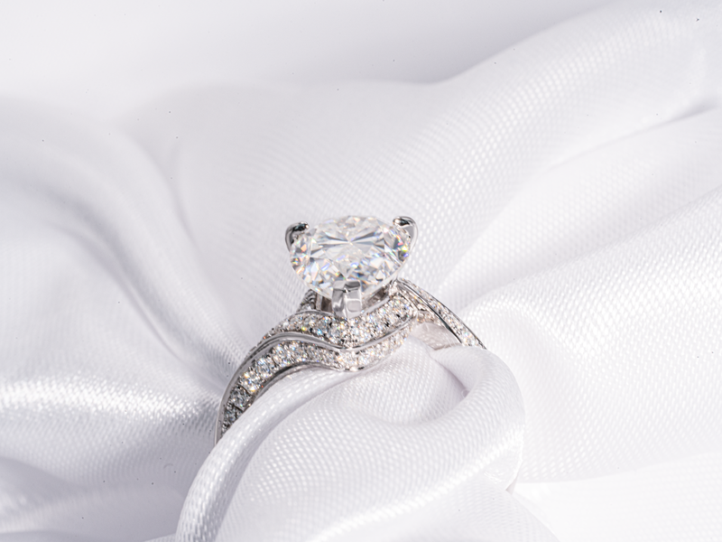 3.5 Carat Pear Shaped Pavé Swirl Moissanite Engagement Ring